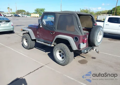 2002 Jeep Wrangler Sahara z USA, uszkodzony, nr VIN 1J4FA59S62P711621